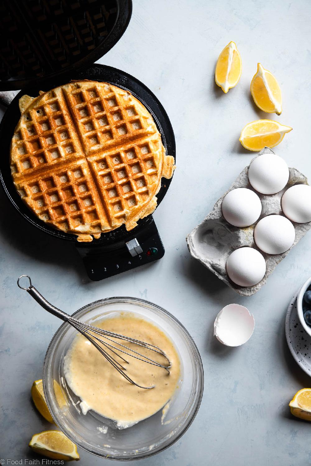 Lemon Blueberry Gluten Free Greek Yogurt Waffles - These gluten free waffles are so crispy and fluffy you will never believe they're low fat, oil free, protein packed and only 170 calories! | #Foodfaithfitness | #Glutenfree #Lowfat #Healthy #Waffles #Breakfast
