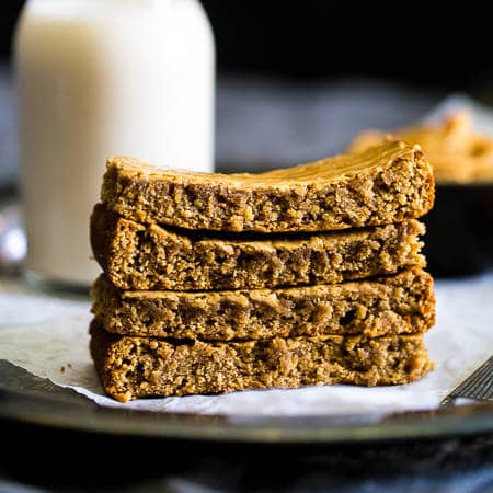Paleo Almond Butter Homemade Protein Bars - 5 ingredients, one bowl and 20 minutes is all you need to make these soft and chewy bars! The a healthy, portable snack! | Foodfaithfitness.com | @FoodFaithFit