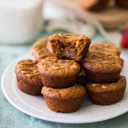 Mini Peanut Butter Muffins with Strawberries - These gluten and grain free muffins are made in the food processor and are ready in 15 minutes! Perfect for a healthy, portable, breakfast or snack! | Foodfaithfitness.com | @FoodFaithFit