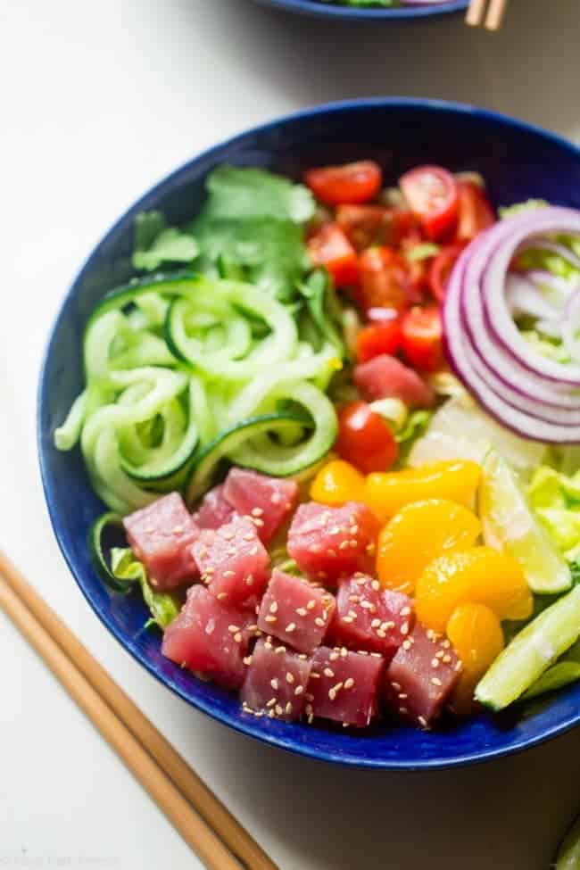 Citrus Tuna Ceviche Bowls - These whole30 compliant bowls are loaded with fresh veggies, zucchini noodles and creamy avocado dressing! They're an easy, healthy and gluten free, no-cook summer meal! | Foodfaithfitness.com | @FoodFaithFit